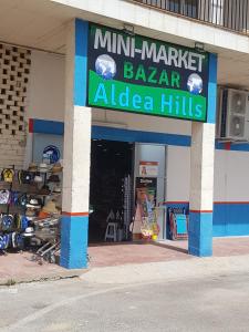Supermarket nebo jiné obchody v  apartmánu nebo okolí