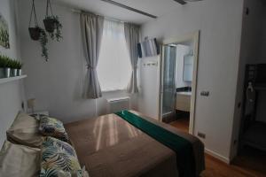 Letto o letti in una camera di B&B Sea and Garden