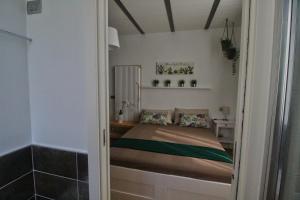 Letto o letti in una camera di B&B Sea and Garden