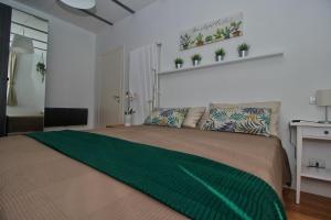 Letto o letti in una camera di B&B Sea and Garden