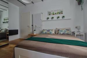 Letto o letti in una camera di B&B Sea and Garden