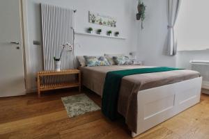 Letto o letti in una camera di B&B Sea and Garden