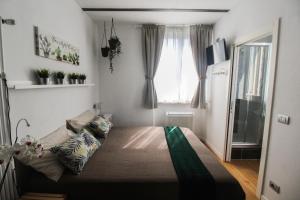 Letto o letti in una camera di B&B Sea and Garden