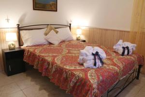 A bed or beds in a room at Polianthi Seaside House