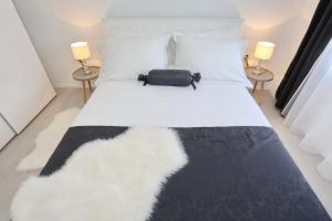 Postel nebo postele na pokoji v ubytování Apartments Tija Exclusive