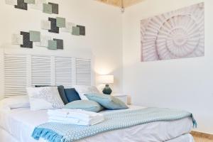 Postel nebo postele na pokoji v ubytování POSEA - Polignano Sea Suites