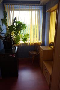 Uma área de estar em Guesthouse Bērzi