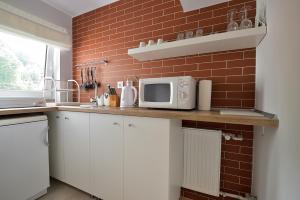 Kuchyňa alebo kuchynka v ubytovaní Apartament Na Górskiej