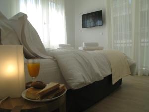 Posteľ alebo postele v izbe v ubytovaní Elegant Acropolis