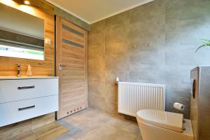 Kúpeľňa v ubytovaní Apartament Na Górskiej + 33 fotografií