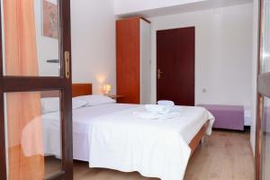 Cama o camas de una habitación en Apartment Maslina