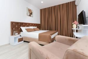 A bed or beds in a room at Villa Casa Mia