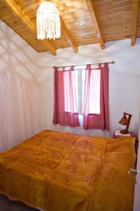 Postel nebo postele na pokoji v ubytování Cabañas Orión + 29 fotografií