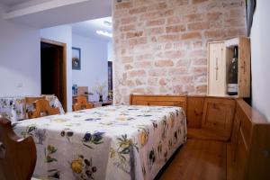 Postel nebo postele na pokoji v ubytování Nido di Rondine B&B