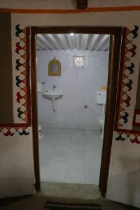 Vonios kambarys apgyvendinimo įstaigoje Banni Village Stay