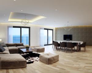 a living room with a couch and a table at Nagar Hotel Nha Trang in Nha Trang