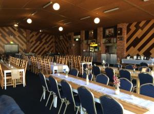 a room with a long table and chairs at Kerang Motel in Kerang +25 photos