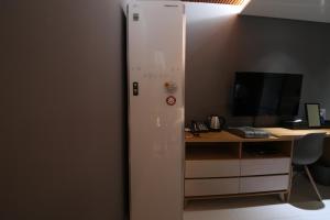 TV a/nebo společenská místnost v ubytování Hotel K