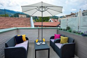 En balkon eller terrasse på Hotel Central Sarajevo