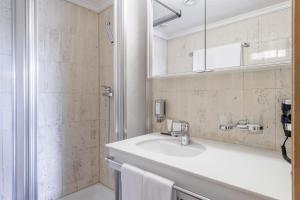 Koupelna v ubytování Boutique Hotel Cervus