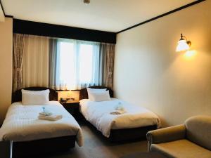 Postel nebo postele na pokoji v ubytování Shakespeare Hotel