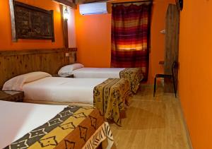 Cama o camas de una habitación en Hotel Plaza