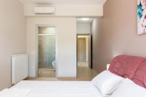 Posteľ alebo postele v izbe v ubytovaní Eudora Luxury Stone Villa