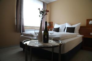 Postel nebo postele na pokoji v ubytování Hotel Mykonos