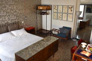 Postel nebo postele na pokoji v ubytování Ca' Monteggia Guest House