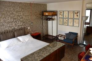 Postel nebo postele na pokoji v ubytování Ca' Monteggia Guest House