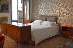Postel nebo postele na pokoji v ubytování Ca' Monteggia Guest House