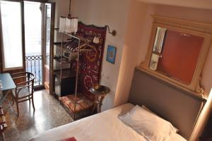 Postel nebo postele na pokoji v ubytování Ca' Monteggia Guest House