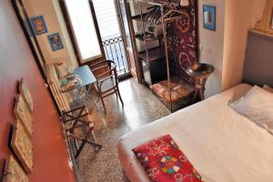 Postel nebo postele na pokoji v ubytování Ca' Monteggia Guest House