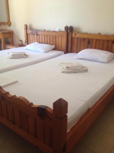 Ένα ή περισσότερα κρεβάτια σε δωμάτιο στο Kalama Apartments