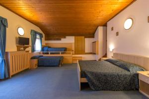 Postel nebo postele na pokoji v ubytování Hotel Siera Hof + 17 fotografií