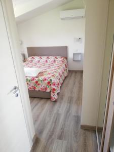 Postel nebo postele na pokoji v ubytování B&B MOLINARI