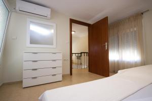 Postel nebo postele na pokoji v ubytování Stasa Luxury Apartments