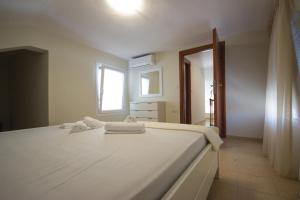 Postel nebo postele na pokoji v ubytování Stasa Luxury Apartments
