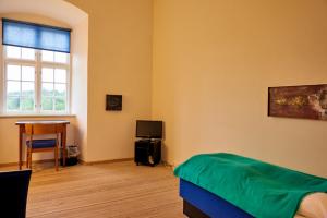 Postel nebo postele na pokoji v ubytování Danhostel Vitskøl Kloster + 33 fotografií