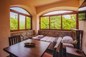 Postel nebo postele na pokoji v ubytování Apartmani i sobe Dinko