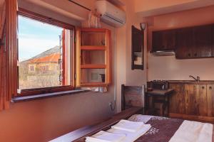 Kuchyň nebo kuchyňský kout v ubytování Apartmani i sobe Dinko