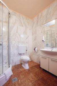 Koupelna v ubytování Apartmani i sobe Dinko