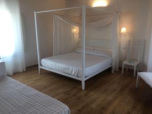 Postel nebo postele na pokoji v ubytování B&B SILVIA