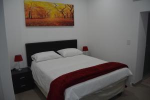 Katil atau katil-katil dalam bilik di Fama Lodge Rm13