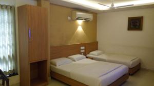 Hotel Kapilavasthu客房内的一张或多张床位