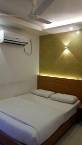 Hotel Kapilavasthu客房内的一张或多张床位