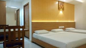 Hotel Kapilavasthu客房内的一张或多张床位