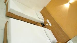 Hotel Kapilavasthu客房内的一张或多张床位
