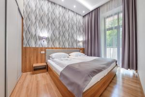 Posteľ alebo postele v izbe v ubytovaní Apartamenty Cypel Helski