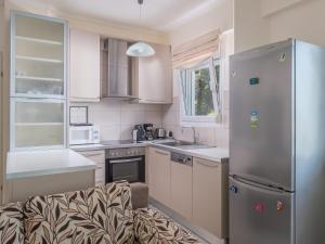 Kuchyň nebo kuchyňský kout v ubytování Aegean Residence - F & B Summer Collection